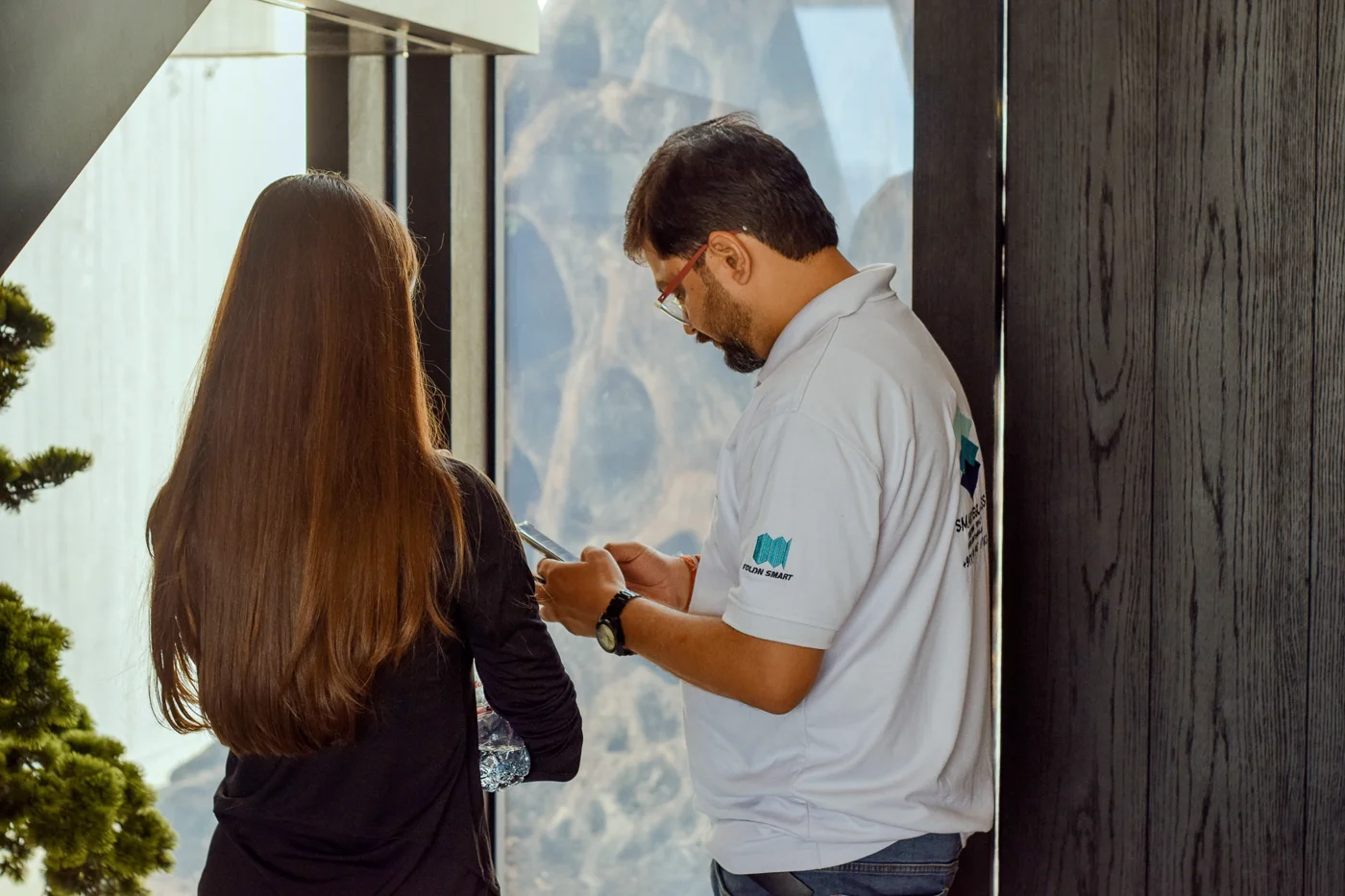SEG technician consulting with a client