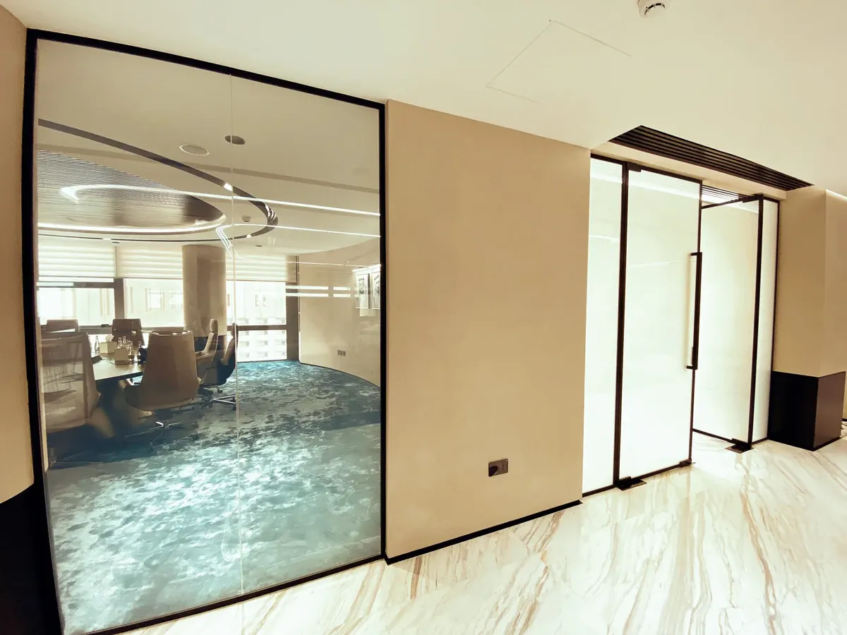 Ultra-slim sliding glass doors with 20mm aluminium profiles installed in contemporary Dubai interior